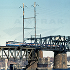 AEM-7 leading a train over the Susquehanna River, 1980s.