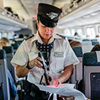 Conductor scanning tickets on the <i>Vermonter</i>, 2015.