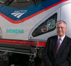 Joseph Boardman with a new ACS-64 locomotive, 2013.