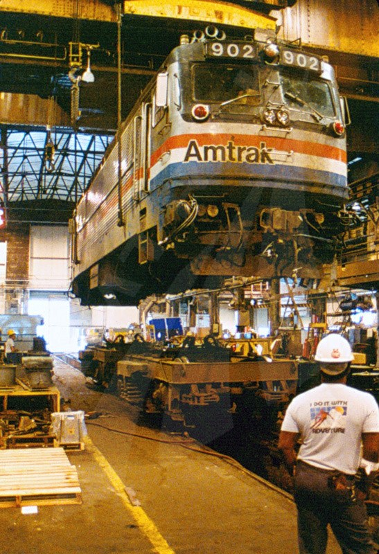 AEM-7 locomotive No. 902 on a crane.