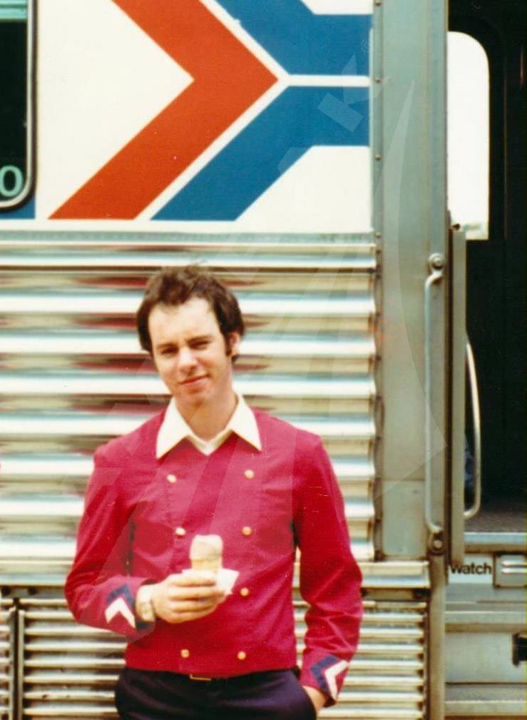 Attendant in red jacket, 1977.