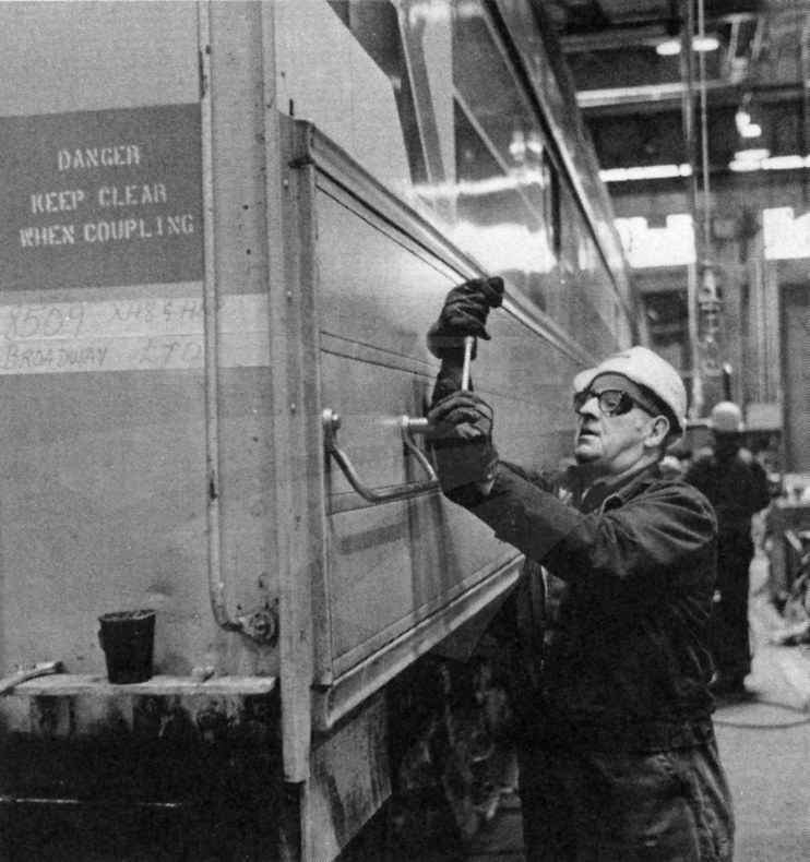 Carman tightening a handhold at Beech Grove, 1980.