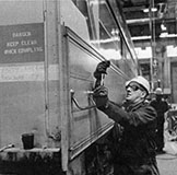 Carman tightening a handhold at Beech Grove, 1980.