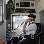 Conductor making an announcement, 2015.