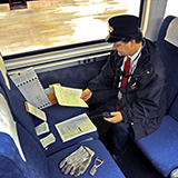 Conductor sorting tickets, 2010.