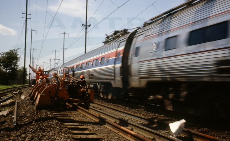 <i>Metroliner Service</i> train passing a track crew, 1978.