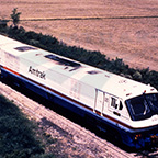 LRC train traveling through the countryside, 1980s.