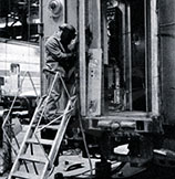 Welder working on a bulkhead at Beech Grove, 1980.
