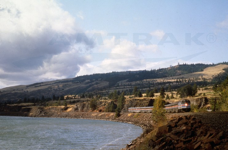 Western long-distance train led by F40PH locomotive No. 217, 1980s.